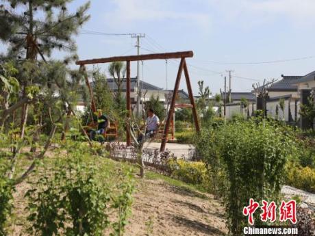 黄土高原山坳“土农村”蜕变“洋小区”